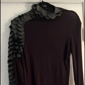 Black mock turtle S but can fit a M/L (runs big)